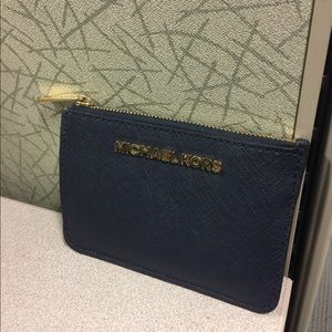 Michael Kors blue wallet.